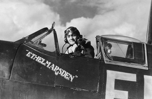 Pilot sitting in a Spitfire*